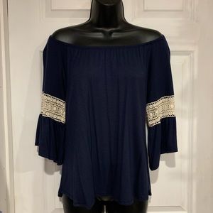 Loose summer top-off or on the shoulder